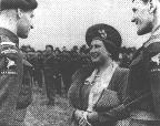 Brigadier Hill presents RSM Clark to H.M. Queen Elizabeth